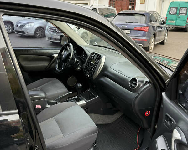 Черный Тойота РАВ 4, объемом двигателя 2 л и пробегом 230 тыс. км за 6500 $, фото 9 на Automoto.ua