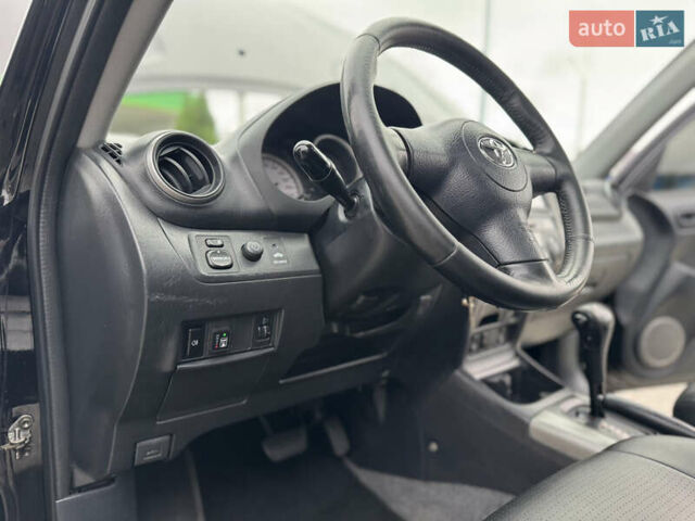 Черный Тойота РАВ 4, объемом двигателя 2 л и пробегом 230 тыс. км за 7850 $, фото 30 на Automoto.ua