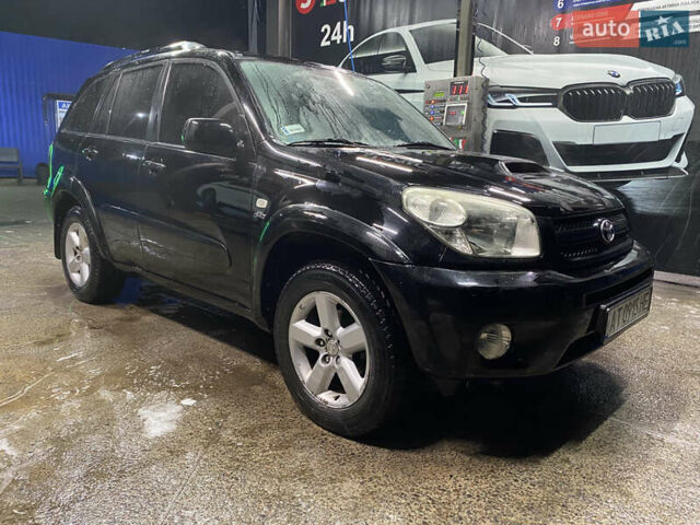 Черный Тойота РАВ 4, объемом двигателя 2 л и пробегом 269 тыс. км за 7500 $, фото 3 на Automoto.ua