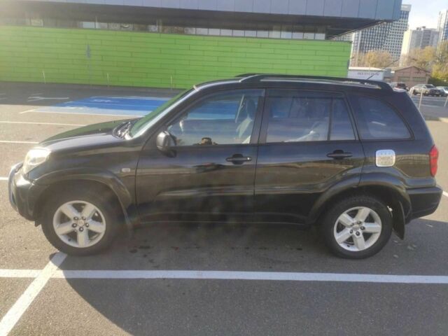 Черный Тойота РАВ 4, объемом двигателя 2 л и пробегом 506 тыс. км за 5300 $, фото 1 на Automoto.ua