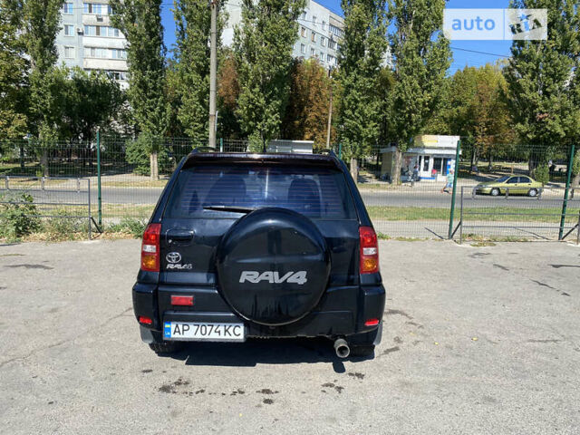 Черный Тойота РАВ 4, объемом двигателя 2 л и пробегом 262 тыс. км за 8800 $, фото 5 на Automoto.ua
