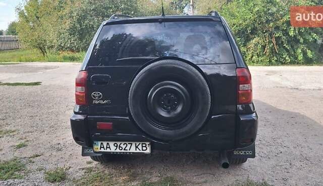 Черный Тойота РАВ 4, объемом двигателя 2 л и пробегом 250 тыс. км за 5200 $, фото 7 на Automoto.ua