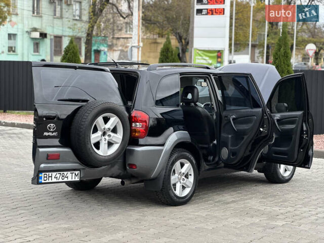 Черный Тойота РАВ 4, объемом двигателя 2 л и пробегом 230 тыс. км за 7850 $, фото 45 на Automoto.ua