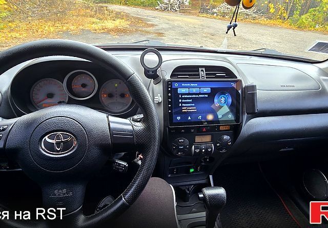 Черный Тойота РАВ 4, объемом двигателя 2 л и пробегом 224 тыс. км за 9000 $, фото 2 на Automoto.ua