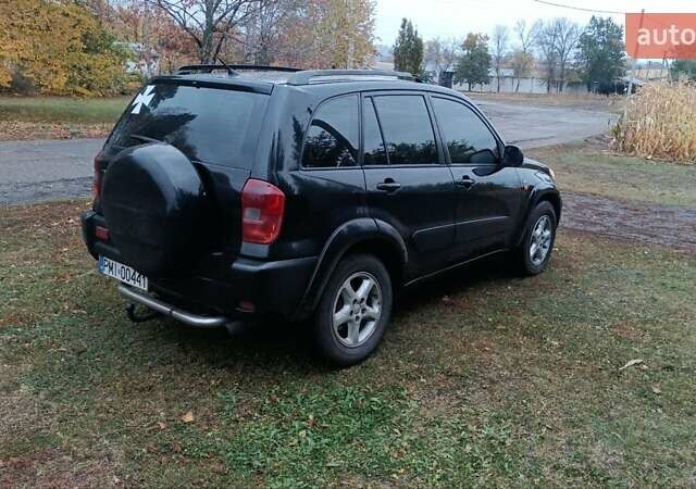 Черный Тойота РАВ 4, объемом двигателя 2 л и пробегом 312 тыс. км за 4300 $, фото 5 на Automoto.ua
