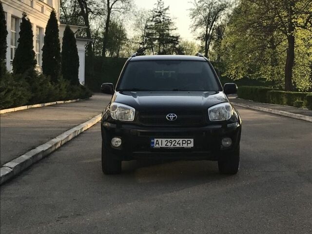 Чорний Тойота РАВ 4, об'ємом двигуна 2 л та пробігом 287 тис. км за 6950 $, фото 3 на Automoto.ua