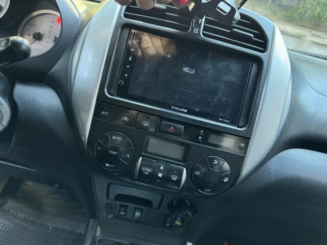 Тойота РАВ 4 2004 в Одессе на Automoto.ua Черный Тойота РАВ 4, объемом двигателя 2 л и пробегом 274 тыс. км за 7000 $, фото 5 на Automoto.ua