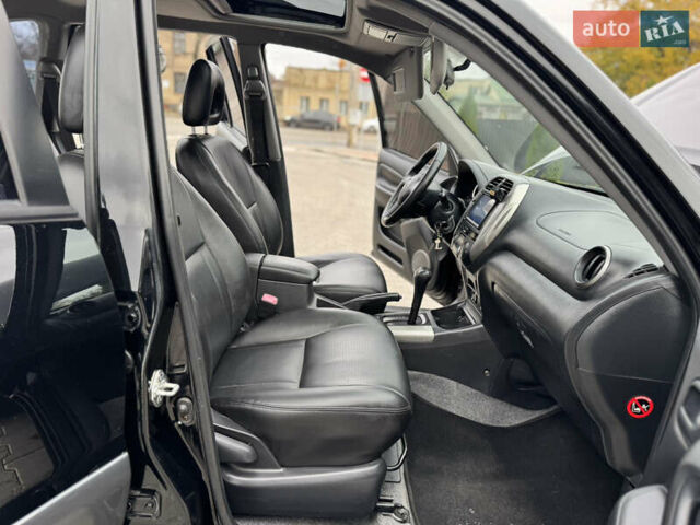 Черный Тойота РАВ 4, объемом двигателя 2 л и пробегом 230 тыс. км за 7850 $, фото 38 на Automoto.ua