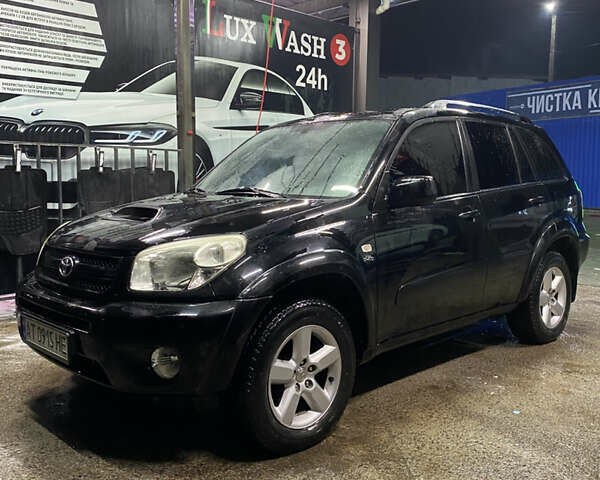 Черный Тойота РАВ 4, объемом двигателя 2 л и пробегом 269 тыс. км за 7500 $, фото 2 на Automoto.ua