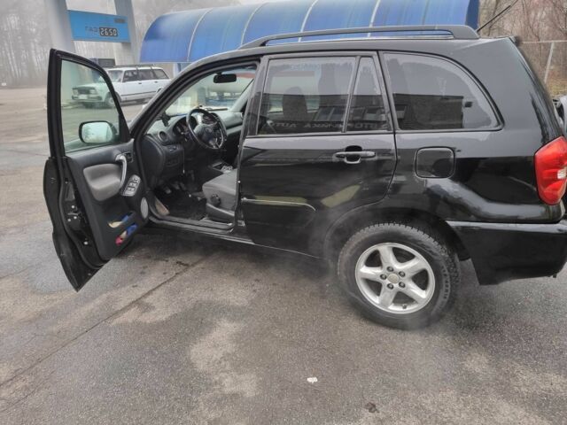 Черный Тойота РАВ 4, объемом двигателя 2 л и пробегом 275 тыс. км за 4800 $, фото 1 на Automoto.ua