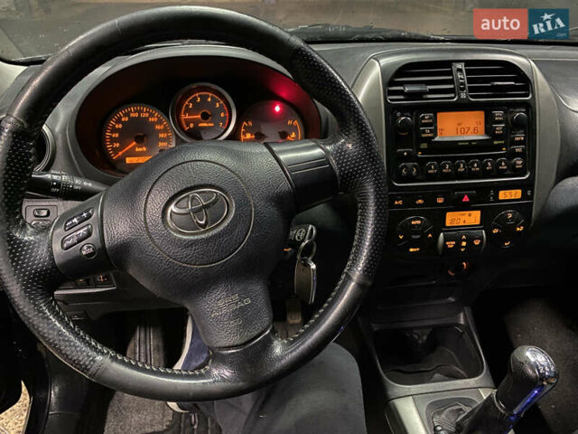 Черный Тойота РАВ 4, объемом двигателя 2 л и пробегом 269 тыс. км за 7500 $, фото 17 на Automoto.ua