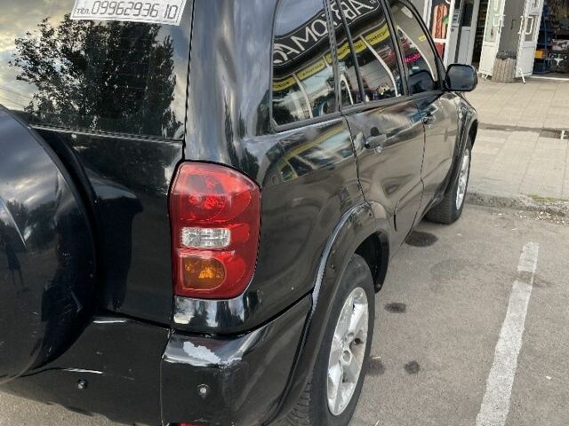 Черный Тойота РАВ 4, объемом двигателя 2 л и пробегом 250 тыс. км за 4800 $, фото 6 на Automoto.ua