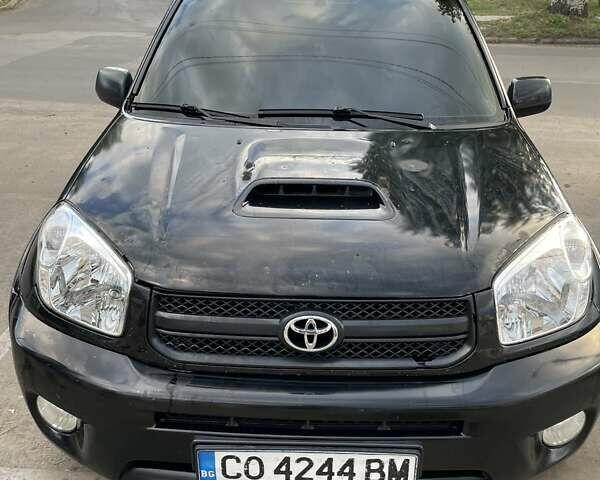 Черный Тойота РАВ 4, объемом двигателя 1.99 л и пробегом 250 тыс. км за 4800 $, фото 6 на Automoto.ua
