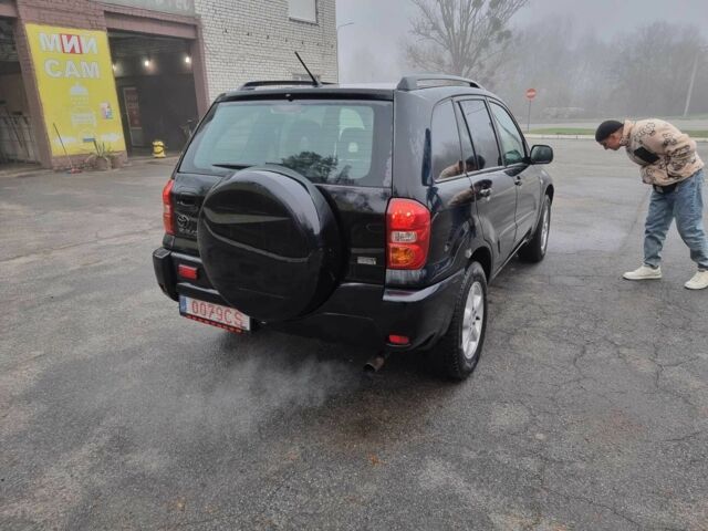 Черный Тойота РАВ 4, объемом двигателя 2 л и пробегом 275 тыс. км за 4800 $, фото 3 на Automoto.ua