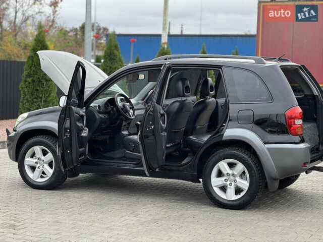 Черный Тойота РАВ 4, объемом двигателя 2 л и пробегом 230 тыс. км за 7850 $, фото 22 на Automoto.ua