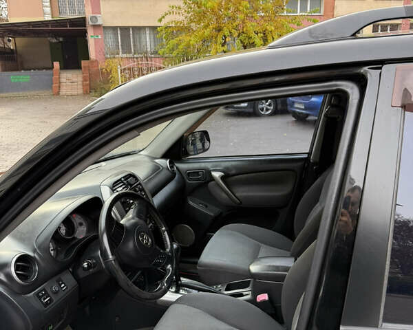 Черный Тойота РАВ 4, объемом двигателя 2 л и пробегом 230 тыс. км за 6500 $, фото 7 на Automoto.ua