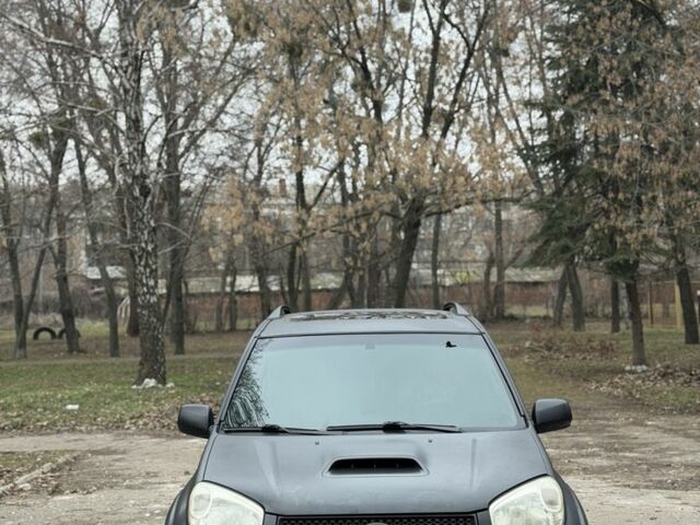 Чорний Тойота РАВ 4, об'ємом двигуна 2 л та пробігом 285 тис. км за 4300 $, фото 2 на Automoto.ua