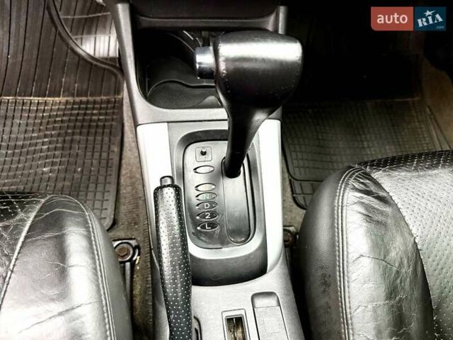 Черный Тойота РАВ 4, объемом двигателя 2 л и пробегом 199 тыс. км за 6999 $, фото 3 на Automoto.ua