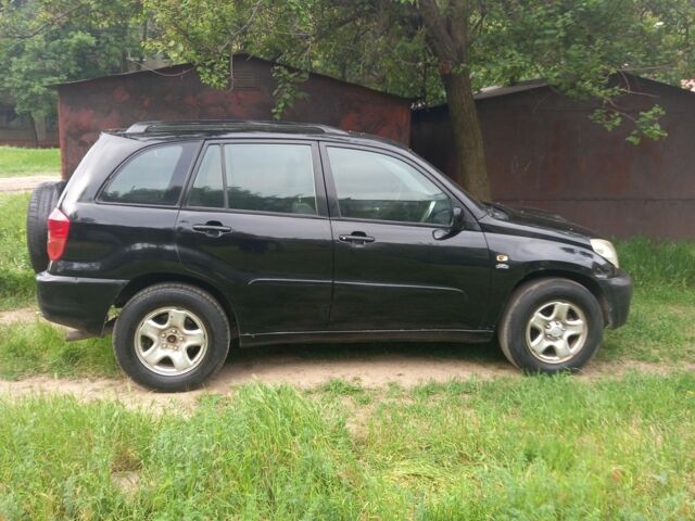 Чорний Тойота РАВ 4, об'ємом двигуна 2 л та пробігом 351 тис. км за 4100 $, фото 1 на Automoto.ua