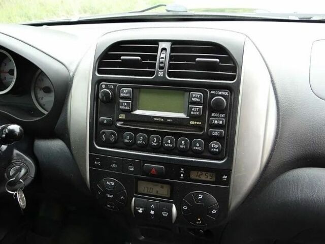 Черный Тойота РАВ 4, объемом двигателя 2 л и пробегом 210 тыс. км за 2600 $, фото 7 на Automoto.ua