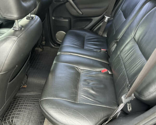 Черный Тойота РАВ 4, объемом двигателя 2 л и пробегом 243 тыс. км за 6900 $, фото 9 на Automoto.ua