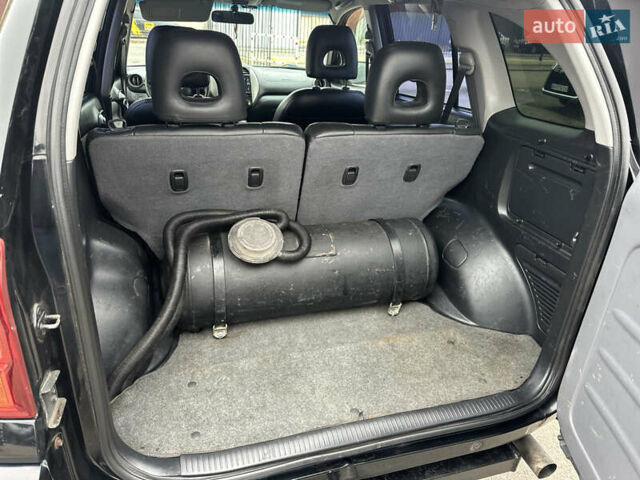 Черный Тойота РАВ 4, объемом двигателя 2 л и пробегом 243 тыс. км за 6900 $, фото 11 на Automoto.ua