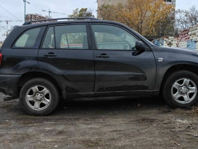 Чорний Тойота РАВ 4, об'ємом двигуна 2 л та пробігом 297 тис. км за 3800 $, фото 1 на Automoto.ua