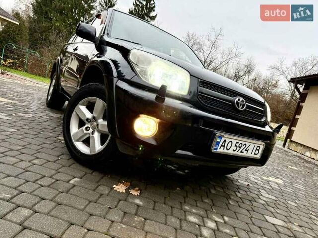Черный Тойота РАВ 4, объемом двигателя 2 л и пробегом 199 тыс. км за 6999 $, фото 83 на Automoto.ua