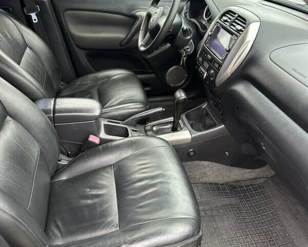 Черный Тойота РАВ 4, объемом двигателя 2 л и пробегом 243 тыс. км за 6900 $, фото 15 на Automoto.ua