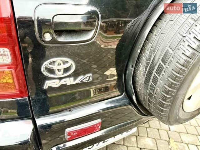 Черный Тойота РАВ 4, объемом двигателя 2 л и пробегом 199 тыс. км за 6999 $, фото 1 на Automoto.ua