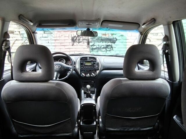 Чорний Тойота РАВ 4, об'ємом двигуна 2 л та пробігом 297 тис. км за 3800 $, фото 7 на Automoto.ua