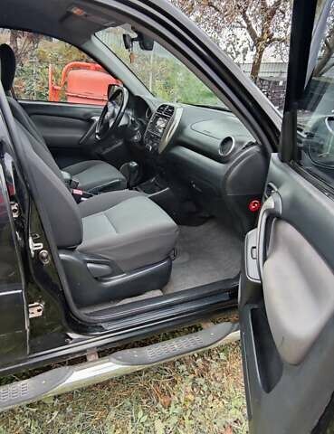 Черный Тойота РАВ 4, объемом двигателя 2 л и пробегом 186 тыс. км за 9500 $, фото 10 на Automoto.ua