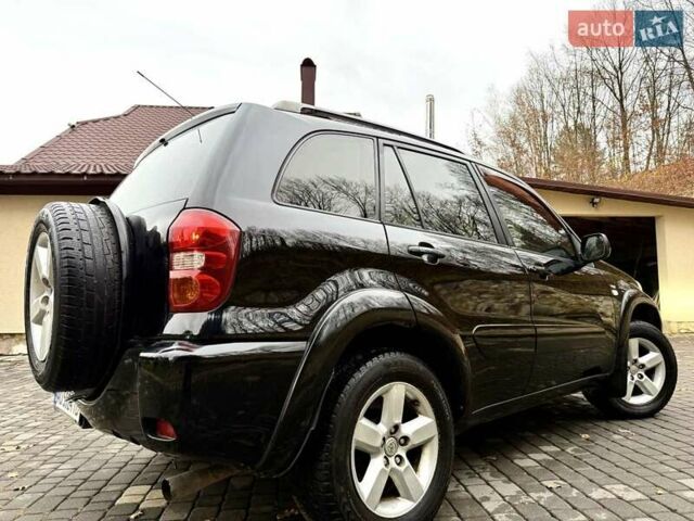 Черный Тойота РАВ 4, объемом двигателя 2 л и пробегом 199 тыс. км за 6999 $, фото 65 на Automoto.ua