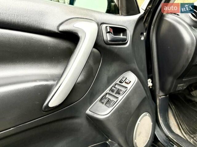 Черный Тойота РАВ 4, объемом двигателя 2 л и пробегом 199 тыс. км за 6999 $, фото 13 на Automoto.ua