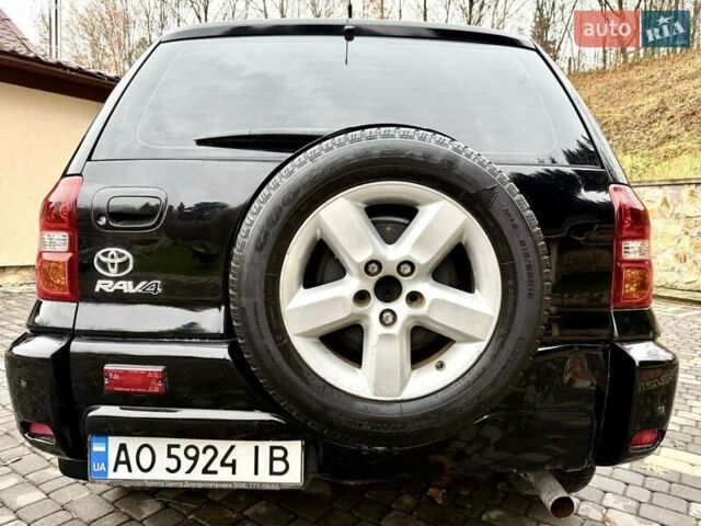 Черный Тойота РАВ 4, объемом двигателя 2 л и пробегом 199 тыс. км за 6999 $, фото 4 на Automoto.ua