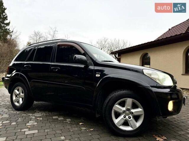 Черный Тойота РАВ 4, объемом двигателя 2 л и пробегом 199 тыс. км за 6999 $, фото 81 на Automoto.ua