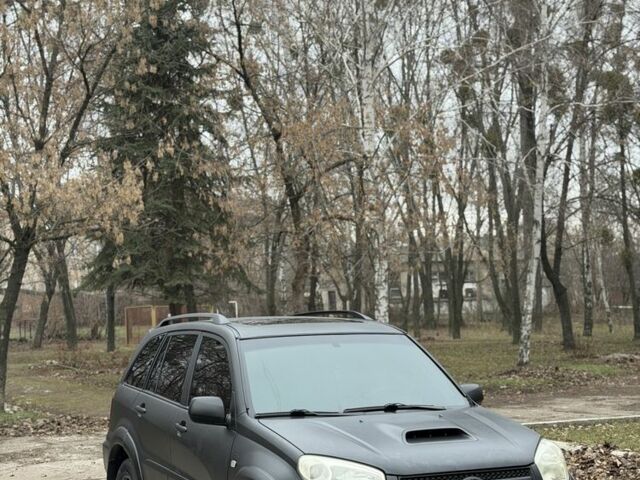 Чорний Тойота РАВ 4, об'ємом двигуна 2 л та пробігом 285 тис. км за 4300 $, фото 1 на Automoto.ua