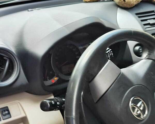 Чорний Тойота РАВ 4, об'ємом двигуна 2.4 л та пробігом 91 тис. км за 12500 $, фото 36 на Automoto.ua