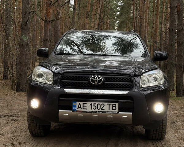 Чорний Тойота РАВ 4, об'ємом двигуна 2 л та пробігом 189 тис. км за 9500 $, фото 2 на Automoto.ua
