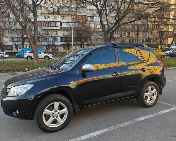 Черный Тойота РАВ 4, объемом двигателя 1.99 л и пробегом 313 тыс. км за 12000 $, фото 1 на Automoto.ua