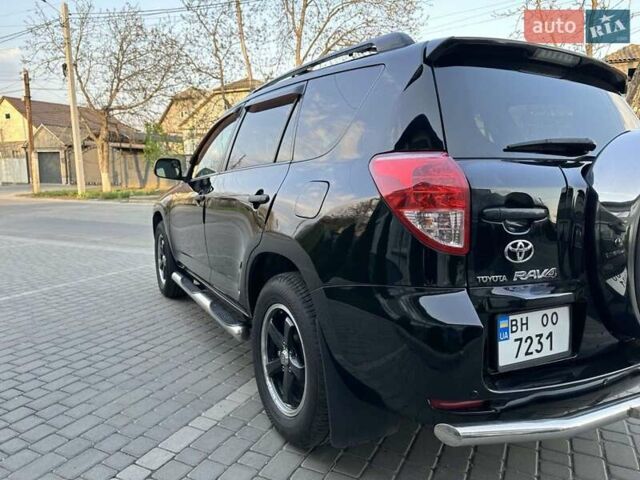 Чорний Тойота РАВ 4, об'ємом двигуна 2.36 л та пробігом 207 тис. км за 9200 $, фото 7 на Automoto.ua