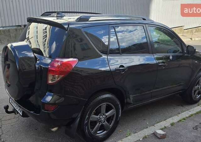 Чорний Тойота РАВ 4, об'ємом двигуна 2 л та пробігом 282 тис. км за 9500 $, фото 6 на Automoto.ua