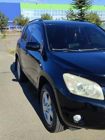 Черный Тойота РАВ 4, объемом двигателя 2 л и пробегом 165 тыс. км за 9500 $, фото 4 на Automoto.ua