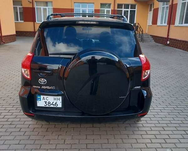 Черный Тойота РАВ 4, объемом двигателя 2.36 л и пробегом 200 тыс. км за 9000 $, фото 6 на Automoto.ua