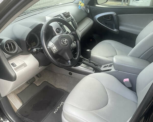 Черный Тойота РАВ 4, объемом двигателя 2.36 л и пробегом 241 тыс. км за 8900 $, фото 5 на Automoto.ua