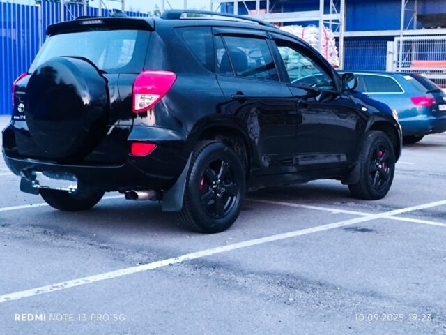 Черный Тойота РАВ 4, объемом двигателя 2 л и пробегом 149 тыс. км за 9490 $, фото 3 на Automoto.ua