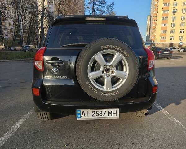 Черный Тойота РАВ 4, объемом двигателя 1.99 л и пробегом 313 тыс. км за 12000 $, фото 2 на Automoto.ua