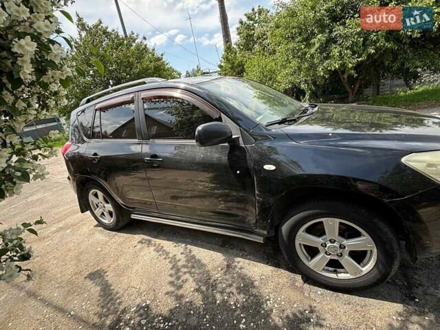 Черный Тойота РАВ 4, объемом двигателя 2 л и пробегом 291 тыс. км за 8400 $, фото 2 на Automoto.ua