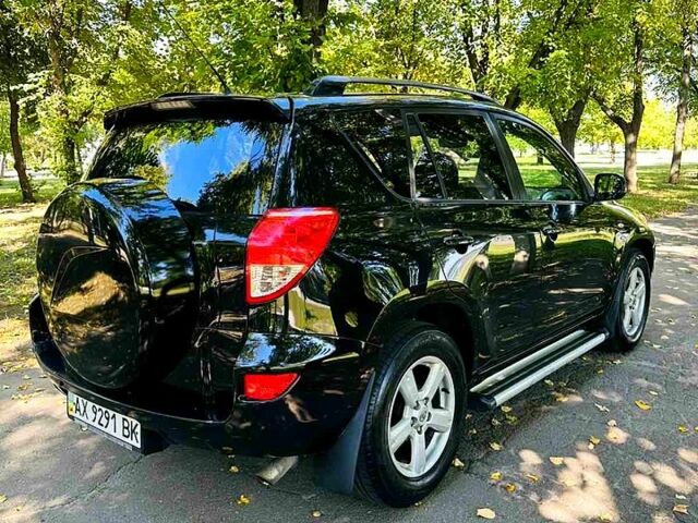 Черный Тойота РАВ 4, объемом двигателя 2 л и пробегом 257 тыс. км за 7999 $, фото 3 на Automoto.ua