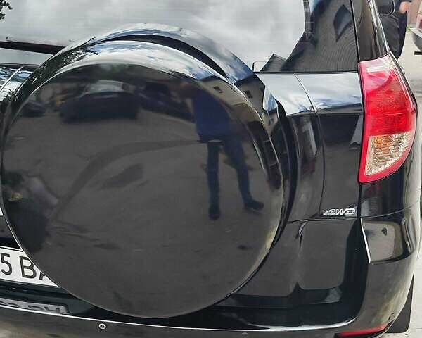 Чорний Тойота РАВ 4, об'ємом двигуна 2.4 л та пробігом 91 тис. км за 12500 $, фото 12 на Automoto.ua